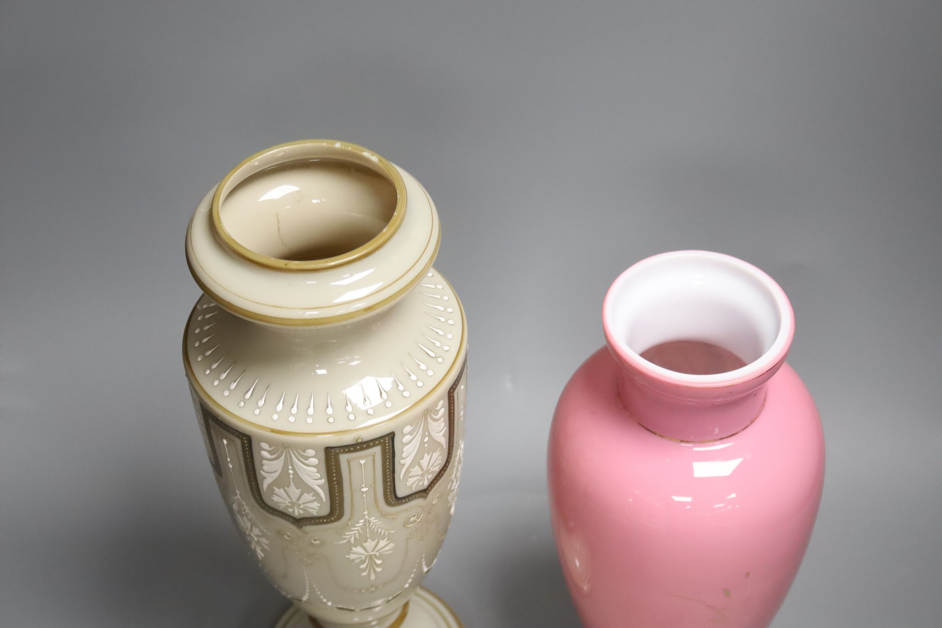 Two 19th century French enamelled glass vases, tallest 38cm